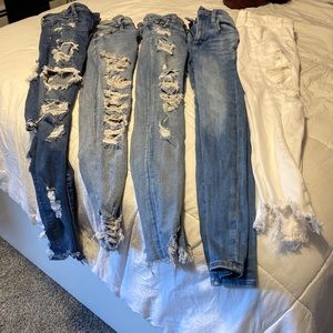 5 pairs of American Eagle Jeans
